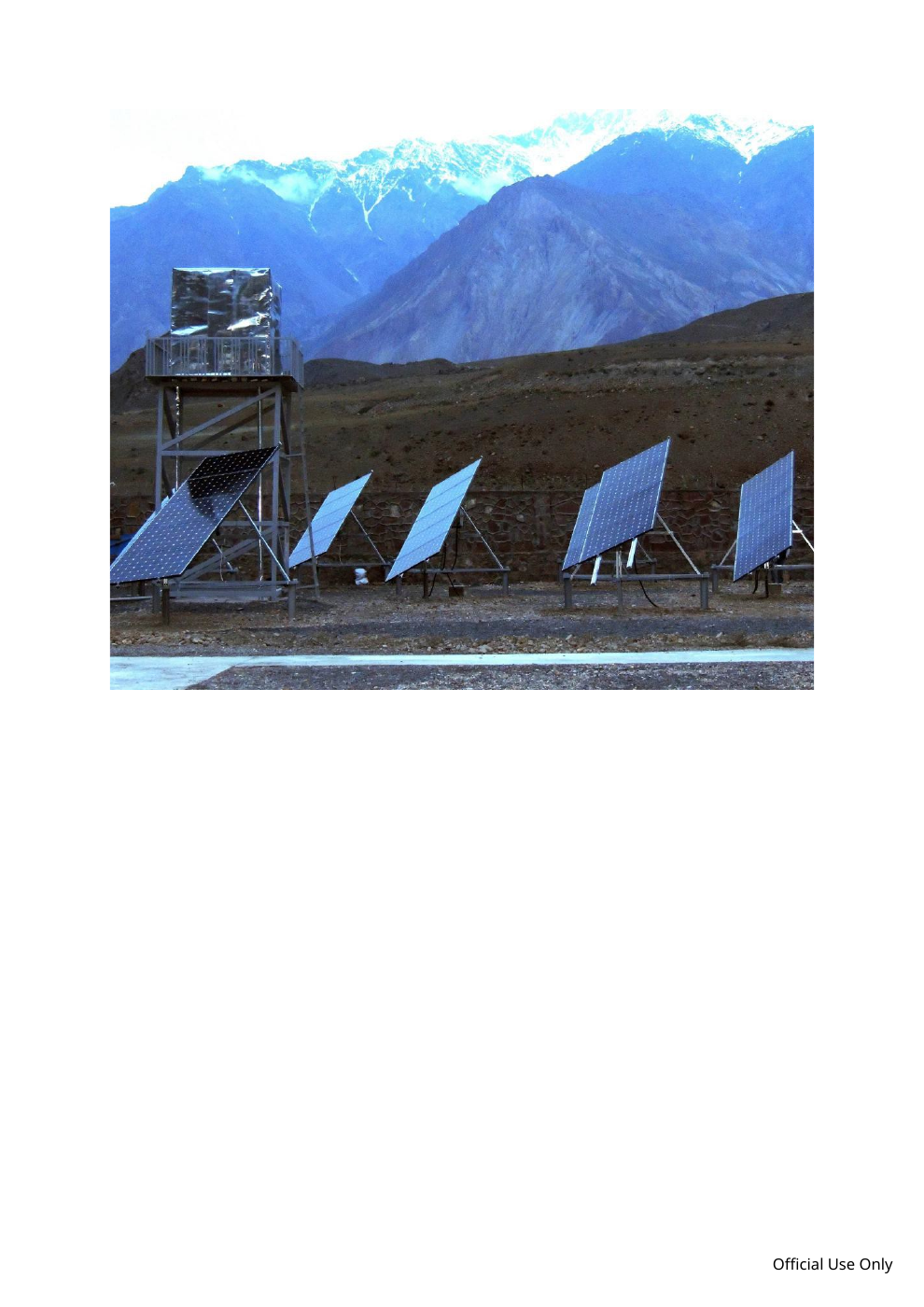 Solar photovoltaic array at the Tajikistan–Afghanistan border crossing, with mountainous landscape